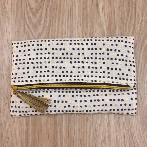 Handbags - NWOT black and gold make up bag/pouch